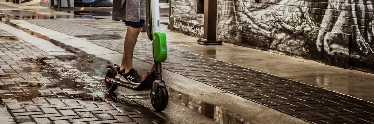 kid using rental scooter